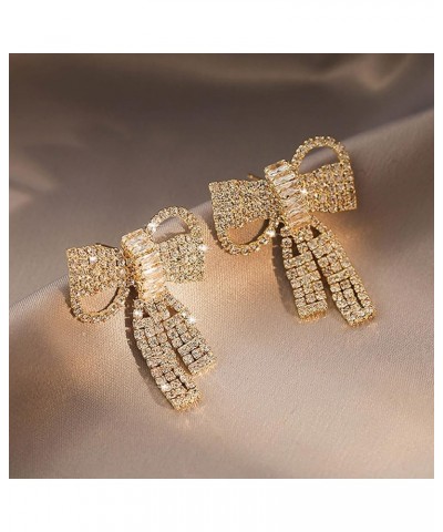 women's simulated diamond earrings hypoallergenic fashion crystal bow pendant earrings Golden diagonal bow $17.40 Earrings