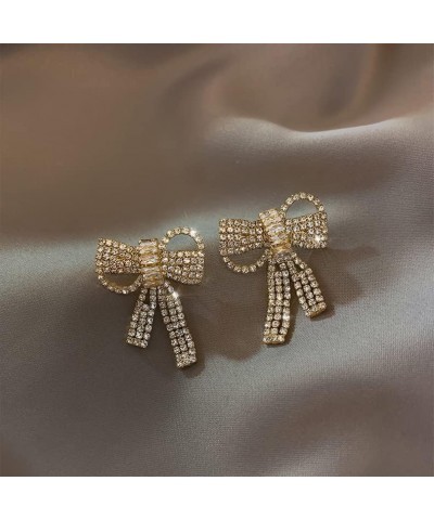 women's simulated diamond earrings hypoallergenic fashion crystal bow pendant earrings Golden diagonal bow $17.40 Earrings