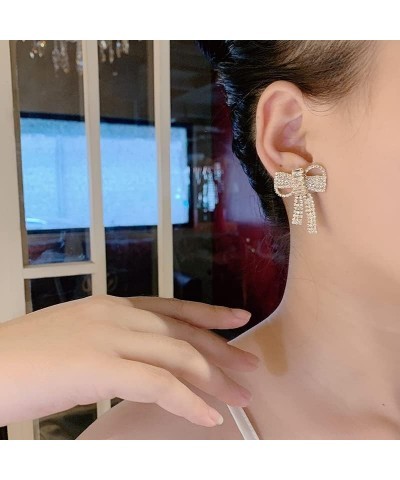 women's simulated diamond earrings hypoallergenic fashion crystal bow pendant earrings Golden diagonal bow $17.40 Earrings