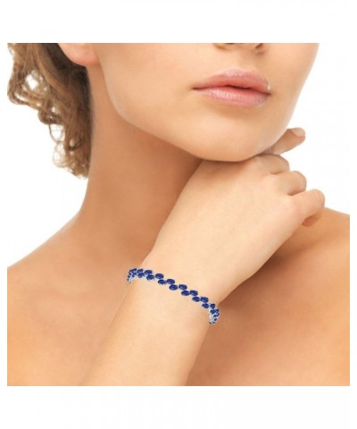 Sterling Silver Genuine, Created or Simulated Gemstone 5x3mm Oval Wave Tennis Bracelet for Women Created Blue Sapphire $43.99...